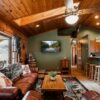 a living room filled with furniture and a flat screen tv